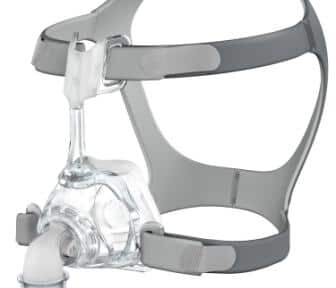 Clear CPAP nasal mask with gray straps, designed for sleep apnea therapy.