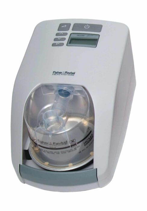A Fisher & Paykel HC150 humidifier with control buttons and a display on the top panel.