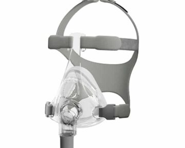 Clear CPAP full face mask with gray headgear straps, designed for sleep apnea therapy.