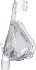 Clear plastic CPAP full face mask labeled "Quattro Air" with headgear attachment points visible.
