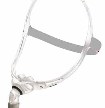 Clear CPAP nasal mask with white headgear and gray strap, featuring a hose connector at the front.