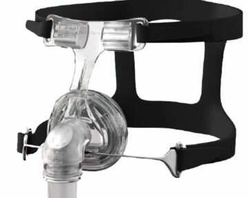 Clear plastic CPAP nasal mask with black adjustable headgear straps, used for sleep apnea therapy.