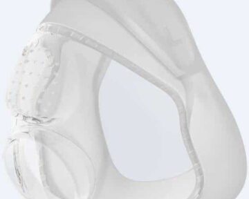 Transparent silicone CPAP nasal mask cushion with a contoured design for a comfortable fit on the face.