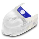 A CPAP humidifier chamber with a blue and white control panel and transparent water reservoir.