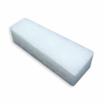 A rectangular white pumice stone block on a white background.