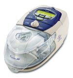 A CPAP machine with a digital display reading "EASY-BREATHE" and a transparent water chamber.