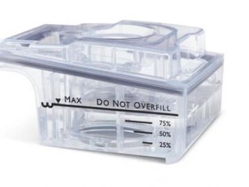 Clear plastic water chamber with measurement markings for 25%, 50%, 75%, and a "Do Not Overfill" line.