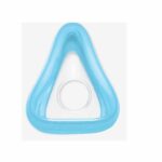 Blue triangular medical face mask cushion with a circular opening in the center, viewed from above.