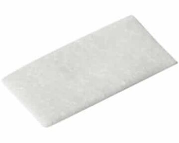 A rectangular white scouring pad on a plain white background.