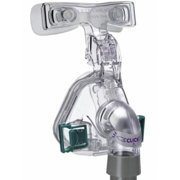 Clear plastic nasal CPAP mask with green side clips and a purple "click" label on the front connector.