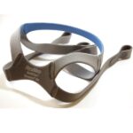Gray and blue CPAP mask headgear labeled "ResMed SoftEdge Quattro Air" on a white background.