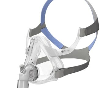 A clear face mask with a blue and gray head strap, labeled "AirFit F10," used for CPAP therapy.