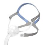A gray and blue CPAP nasal mask with headgear and a hose attachment for sleep apnea therapy.