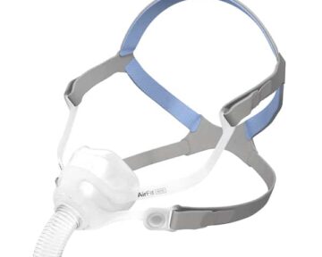 A gray and blue CPAP nasal mask with headgear and a hose attachment for sleep apnea therapy.