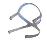 Gray and blue CPAP headgear with adjustable straps isolated on a white background.