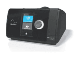 A ResMed AirSense 10 CPAP machine with a display screen and control knob on the front.
