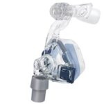 Clear plastic CPAP mask with blue accents and a gray connector, shown on a white background.