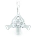 Clear CPAP nasal mask viewed from the front, with headgear attachment points and a round exhalation valve.