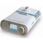 A white CPAP machine with a display screen and a water chamber attached on the side.