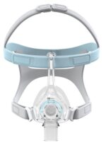 A clear CPAP face mask with adjustable grey and blue head straps, viewed from the front.