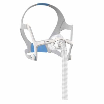 CPAP face mask with headgear and tubing, used for sleep apnea therapy, shown on a white background.