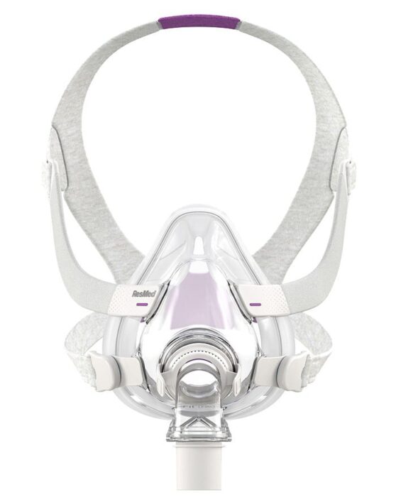 Clear CPAP face mask with grey straps and purple accents, viewed from the front.