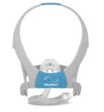 Gray and blue ResMed CPAP mask with attached hose, viewed from the front against a white background.