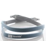 Light blue and gray headgear strap labeled "F&P Brevida" on a white reflective surface.