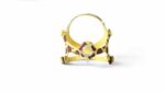 Yellow and brown giraffe-print dog harness with an open circular center, shown on a white background.