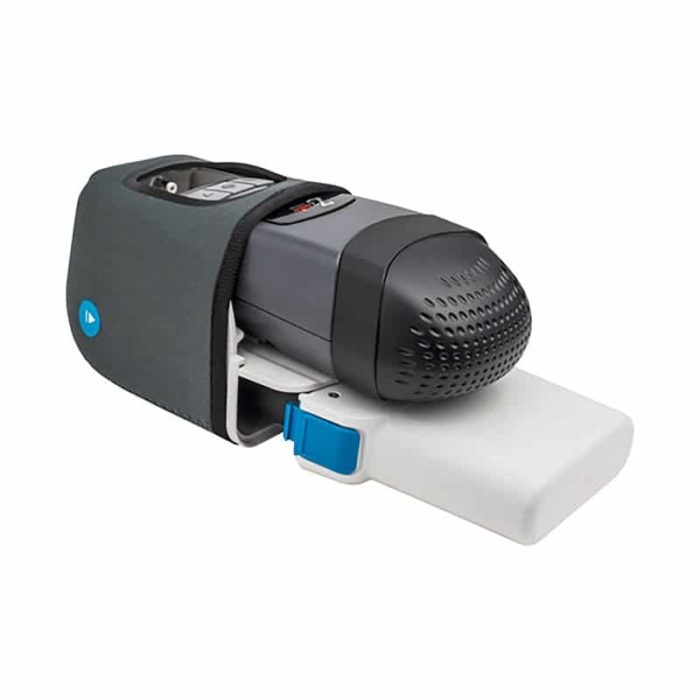 A compact HDM Z2 Travel Auto CPAP Machine with a blue and black cover.