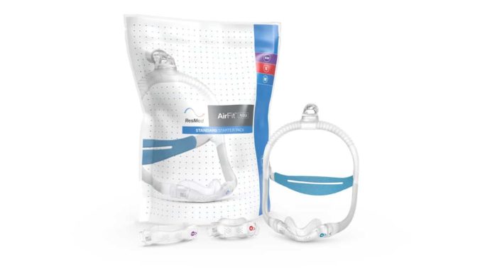 A package of a [ResMed AirFit N30i Nasal CPAP Mask] and a pair of earplugs.