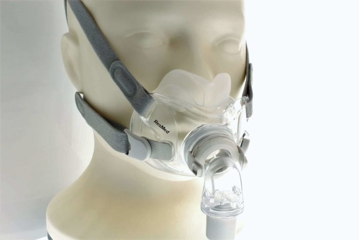 A mannequin head with a ResMed AirFit F30 Full Face CPAP Mask on it