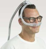A man wearing the ResMed AirFit N30i Nasal CPAP Mask.