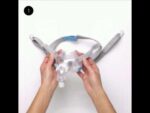A person is putting on a [ResMed AirFit F30 Full Face CPAP Mask].