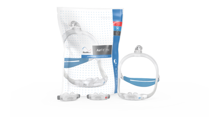 A package of a ResMed AirFit P30i Nasal Pillow CPAP Mask with headgear.