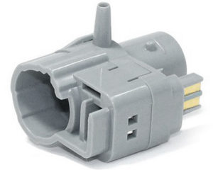 A gray plastic So Clean Adapter for Fisher & Paykel Sleepstyle Series CPAP sanitizing equipment.