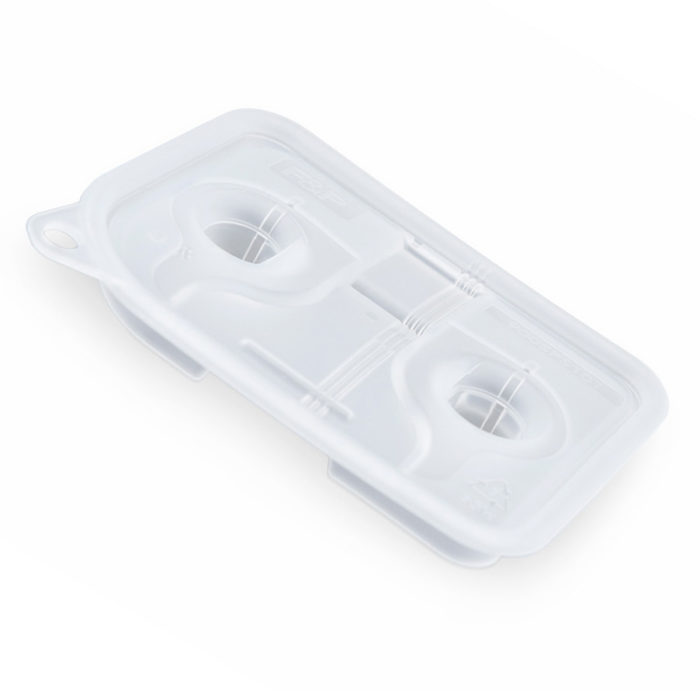 A white plastic tray with two holes on it, ideal for Fisher & Paykel Sleepstyle Chamber Seal Replacement.