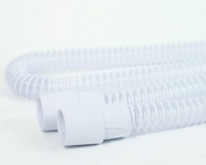 A pair of white Z2 & Z1 Travel CPAP Slimstyle Tubing hoses on a white surface.