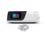 A small white-screened device with a Res Med Airsense 11 Standard Humidifier Chamber companion.
