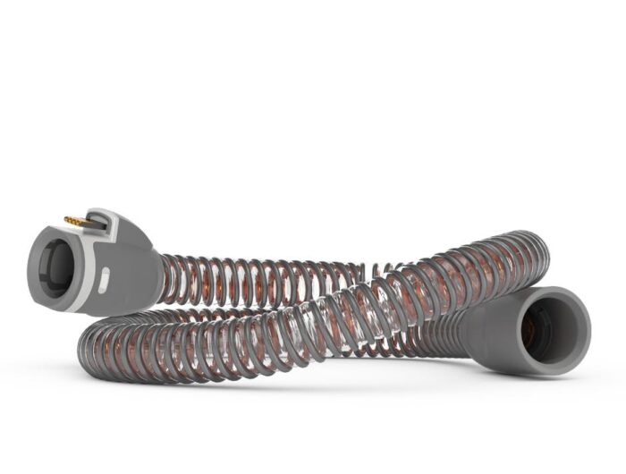 A medical hose with ResMed AirSense 11 Autoset APAP Machine with HumidAir Humidifier and Heated Tubing on a white background.