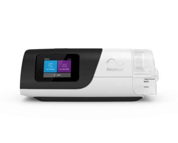 A white and black machine with a touch screen, ResMed AirSense 11 Autoset APAP Machine with HumidAir Humidifier and Heated Tubing.