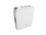 An Inogen One G5 Portable Oxygen Concentrator with 16 Cell Battery/Extended Life Battery device with a blue screen on it.