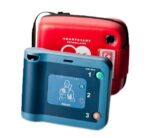 A red and blue Philips HeartStart FRx AED with a carrying case.