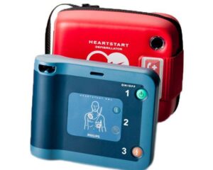 A red and blue Philips HeartStart FRx AED with a carrying case.