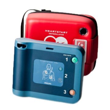 A red and blue Philips HeartStart FRx AED with a carrying case.