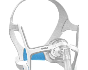 A ResMed Airtouch N20 nasal CPAP mask with a grey and blue headgear and transparent tubing, shown against a white background.