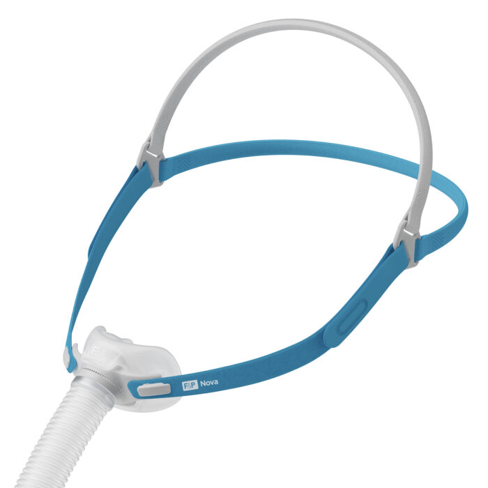 A Fisher & Paykel Nova Micro Nasal Pillow CPAP Mask (Fit Pack) with a flexible blue headband and a transparent nosepiece connected to a white hose.