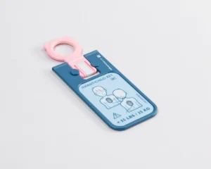 Blue and pink infant/child key for adjusting a car seat, with a paired illustration showing proper use for children under 55 lbs. HeartStart FRX Replacement Adult SMART Pads II (1 Pair) (Copy).