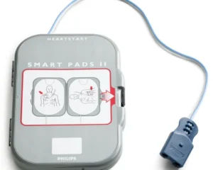 Grey HeartStart FRX Replacement Adult SMART Pads II (1 Pair) (Copy) case with blue cable, showing diagrams for pad placement on chest, ideal for AED replacement adult SMART pads.