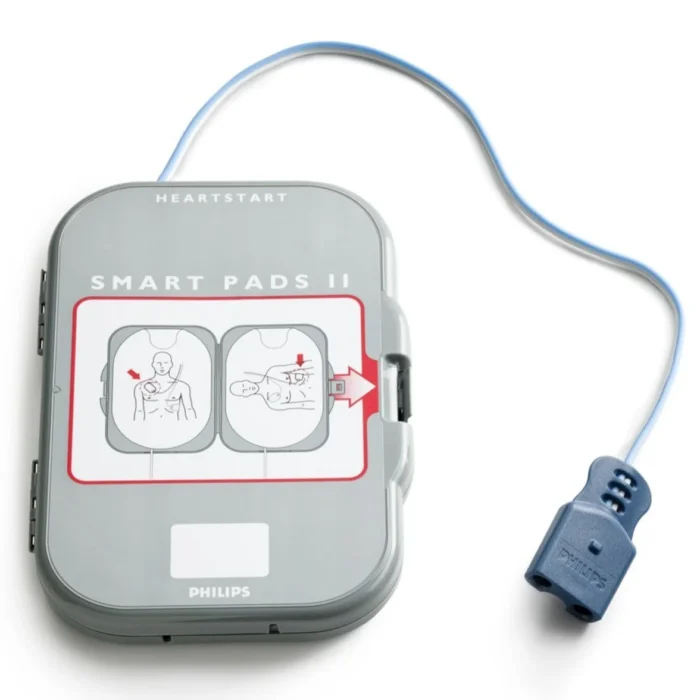 Grey HeartStart FRX Replacement Adult SMART Pads II (1 Pair) (Copy) case with blue cable, showing diagrams for pad placement on chest, ideal for AED replacement adult SMART pads.